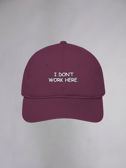 I DON'T WORK HERE UNISEX BASEBALL CAP