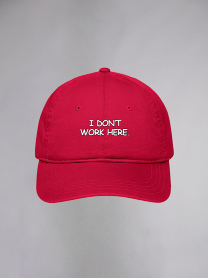 I DON'T WORK HERE UNISEX BASEBALL CAP