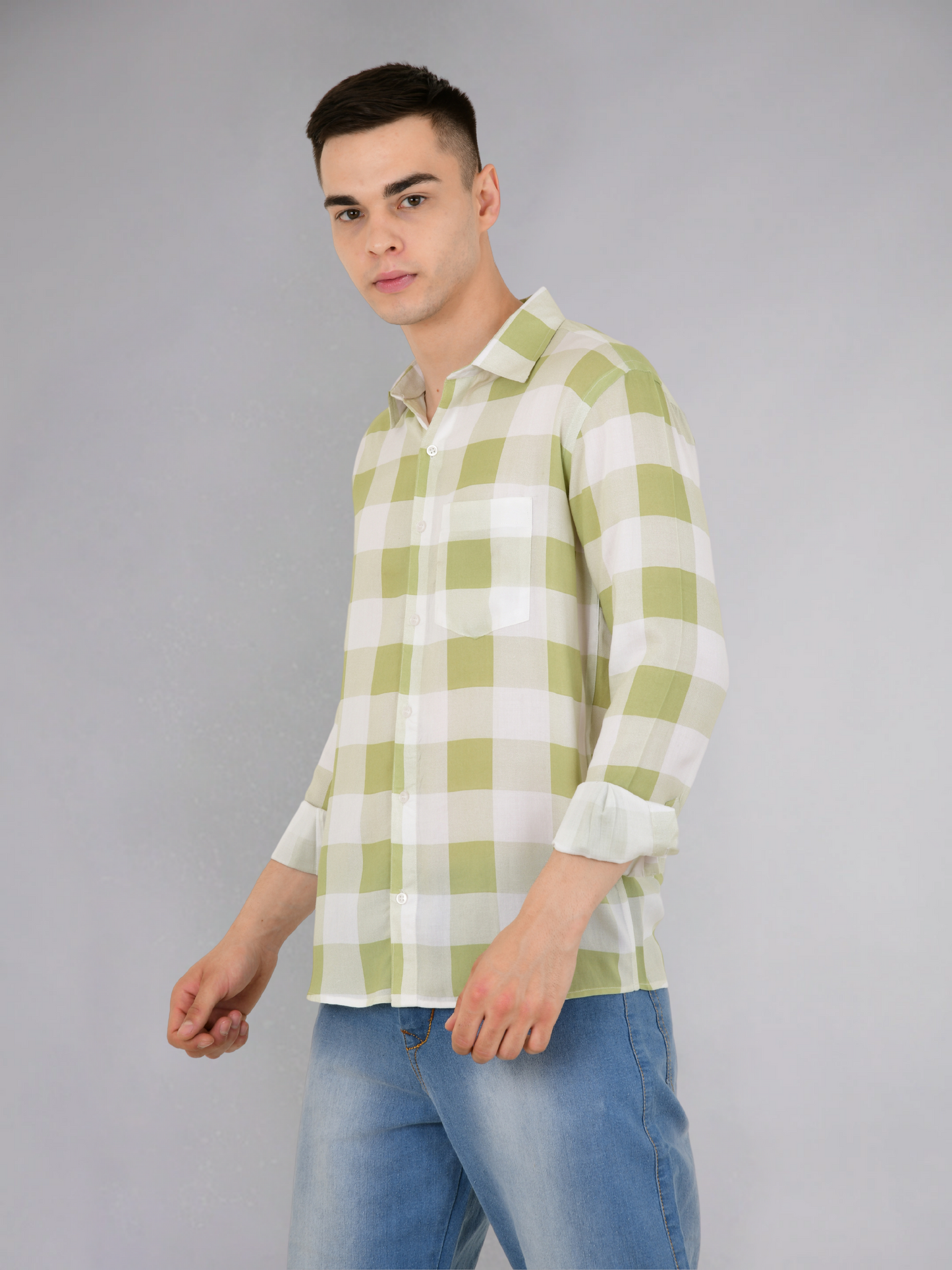 Close-up of green check pattern on cotton shirt