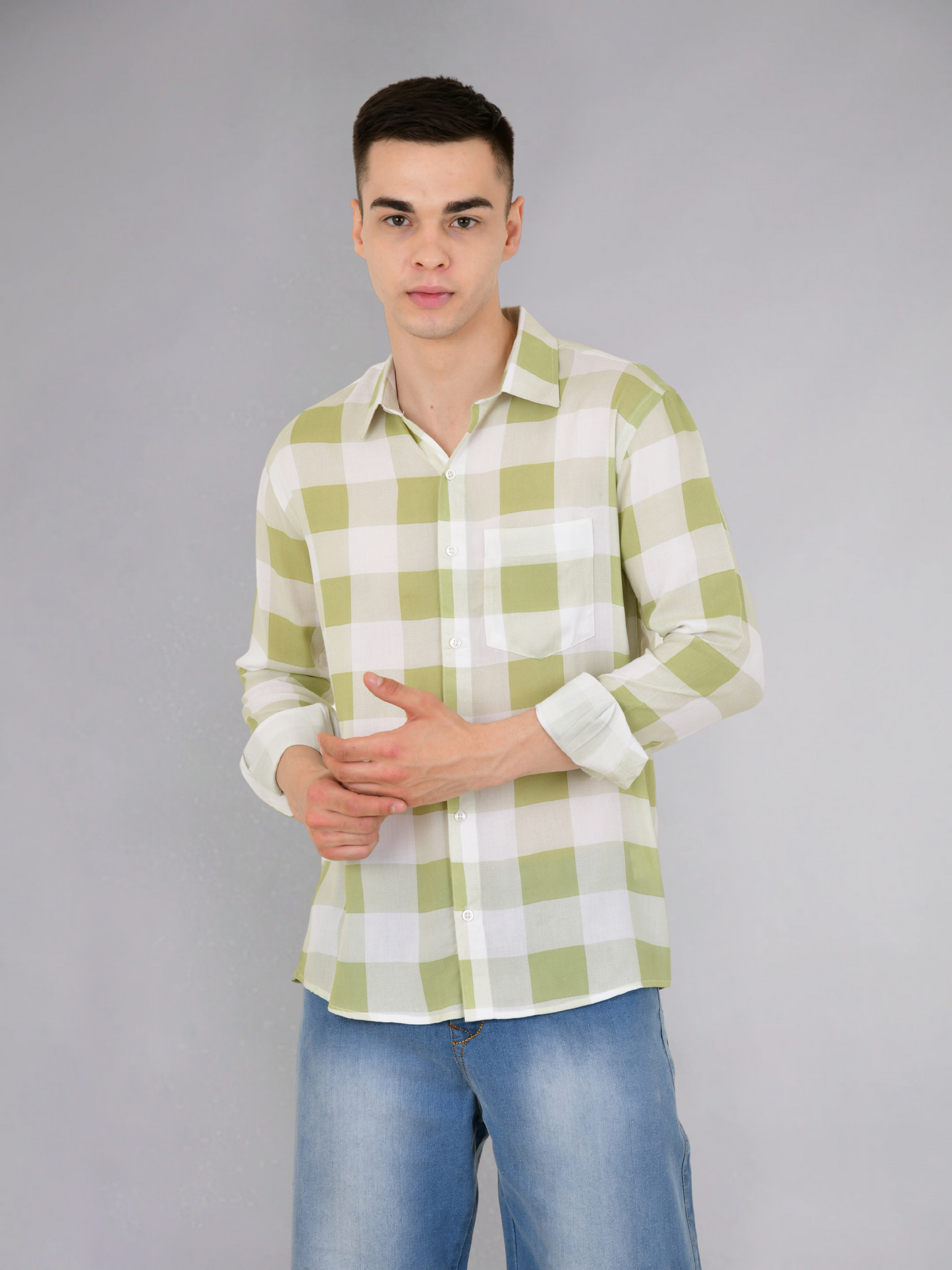 Model wearing green check full sleeves cotton shirt, showcasing fit