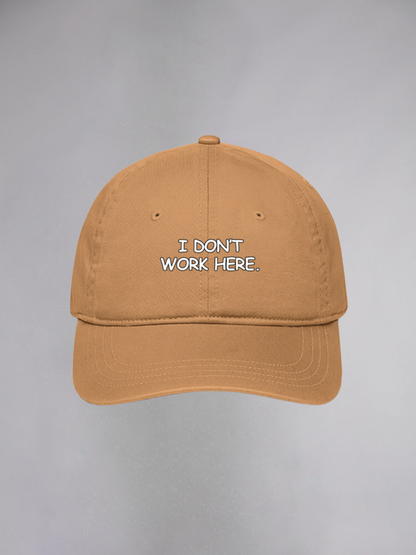 I DON'T WORK HERE UNISEX BASEBALL CAP