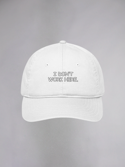 I DON'T WORK HERE UNISEX BASEBALL CAP