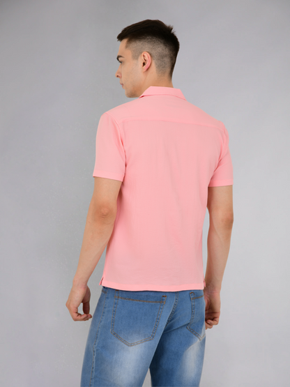 Back view of a pink popcorn texture shirt highlighting its unique texture