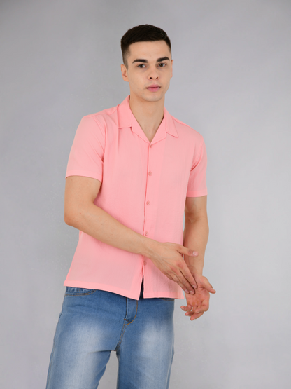 Pink popcorn texture shirt displayed on a model